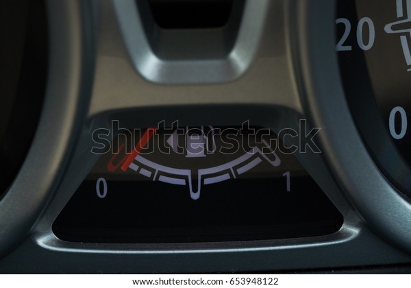 Set of car dash boards\
petrol meter, fuel gauge, on black background concept warning\
checking oil
