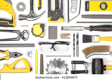 set of carpentry tools on white background. carpenter working table. carpentry and woodwork industry flat lay concept top view
