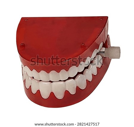 A set of chattering teeth wind up toy