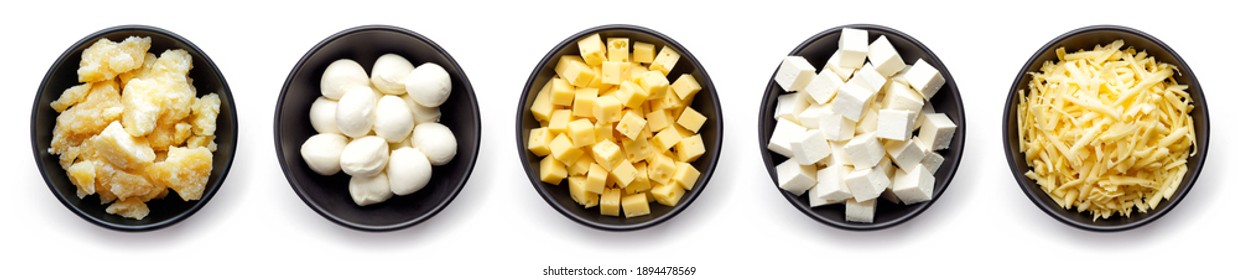 Set of cheese - parmesan, mozzarella, diced, grated and soft cheese in bowl isolated on white background, top view