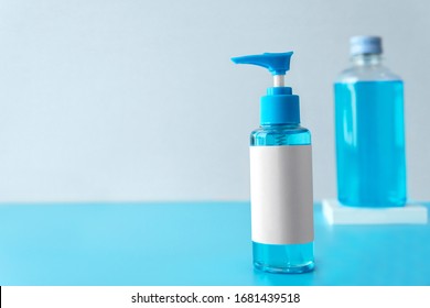 Set Of Chemical Blue Isopropyl Alcohol (Ethanol Or Ethyl Alcohol) Liquid In A  Plastic Press Pump Head Blue Bottle With Blank Label For Medical And Prevent From Germs, Bacterial,coronavirus COVID-19.