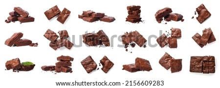Set of chocolate brownie pieces on white background