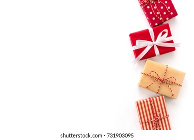 Set Of Christmas And New Year Holiday Gift Boxes On White Background, Creative Idea Border Design With Copy Space On The Left