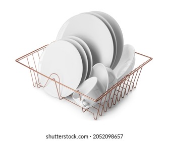 Set Of Clean Dishes In Drainer On White Background