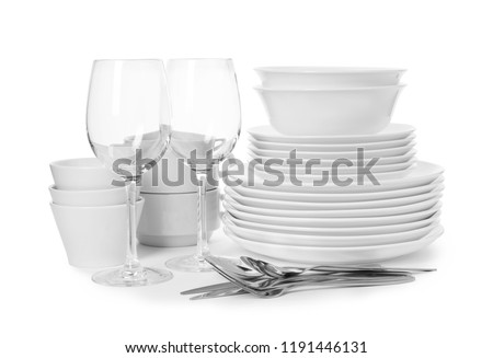 Set of clean tableware on white background. Washing dishes