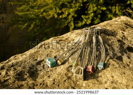 A set of climbing nuts used for rock climbing protection