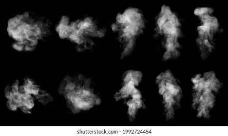 Set. Close-up of steam or abstract white smog rising above. water droplets that can be seen that swirl beautifully from humidifier spray. Isolated on a black background