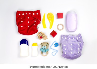 Set of cloth diaper, baby cosmetics and child stuff. Eco friendly cloth nappies for newborn. Baby hygiene concept. Flat lay, top view
