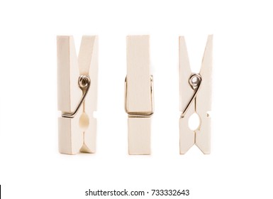 Set of clothes pegs isolated on white background.