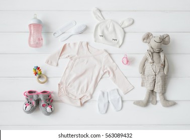 Set of clothing and items for a baby