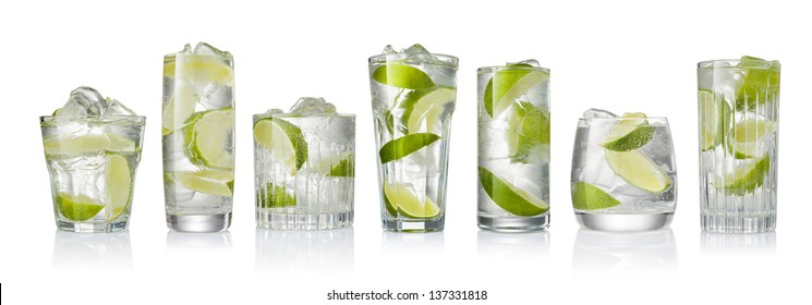 Set of the cocktails with ice and lime slice isolated on white background