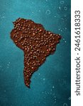 Set of coffee beans and ground coffee in the shape of a world map. Coffee from Brazil or South America.
