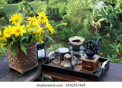 The set of coffee dripper makers with a beautiful Mexican Sunflower bouquet, Includes a Manual Coffee Grinder, Pour Over Kettle, Coffee Dripper, 2 Tasting Cup, Coffee Filters Paper - Powered by Shutterstock