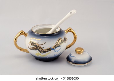 Set of coffee. Sugar bowl with spoon. Blue-eyed, golden dragon pattern.