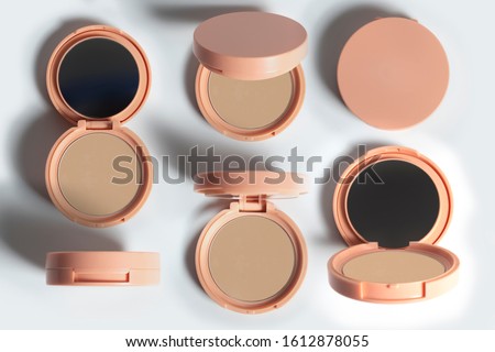 set collection group of beauty fashion makeup color professional powder cushion foundation bb cream compact with plastic round case container packaging on white background 