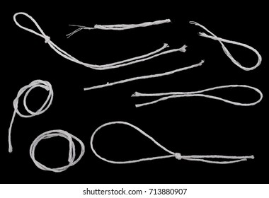 Set, collection white strings isolated on black background texture