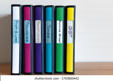 Set Of Color Coded Files And Binders Used By Bookkeeper And Accountant