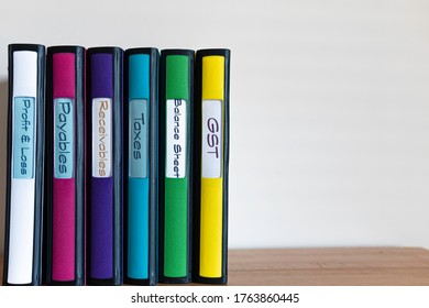 Set Of Color Coded Files And Binders Used By Bookkeeper And Accountant