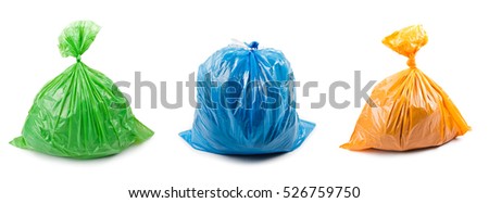 A set of colored garbage bags isolated on white background. Collage of garbage bags.
