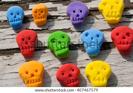 Set of colored plastic skulls for children's games