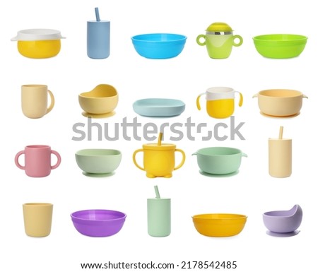 Set with colorful dishware on white background. Serving baby food