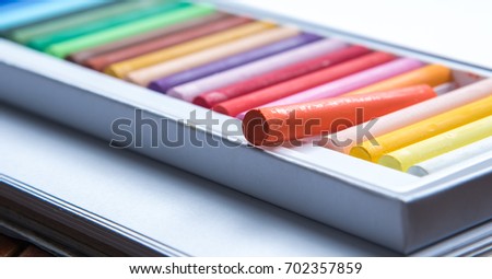 set of colorful oil pastels on white background