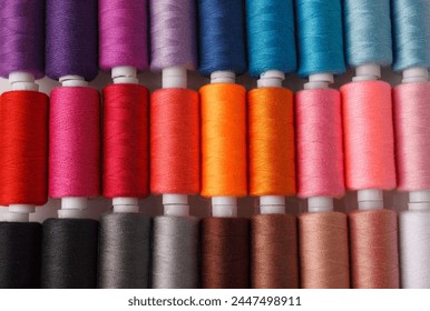 Set of colorful spools of thread close up - Powered by Shutterstock