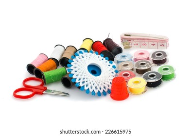 Set of colorful spools of thread isolated on white background