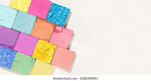 Set colors swatches powder eyes  close up cosmetic texture product for makeup beige background  wide banner  Colorful eyeshadow palette  beauty branding  pastel color aesthetic pattern  copy space