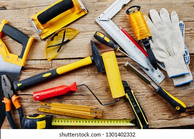 Set Of Construction Tools On A Wooden Background Top View