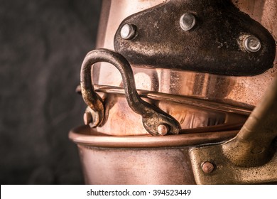 Set of copper pots and pans horizontal