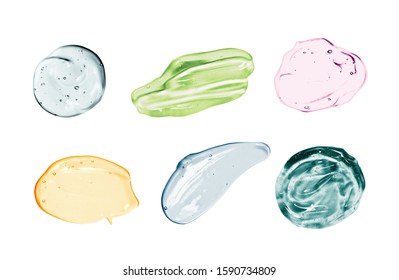 Set of cosmetic gel, serum swatches isolated on white background. Different colored transparent skincare product smear smudge sample collection. Liquid cream with bubbles texture