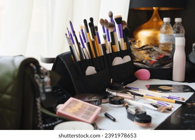 A set of cosmetics and brushes for professional makeup. Make-up artist services for the bride.