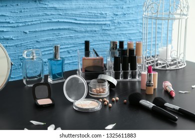 Set of cosmetics on dressing table