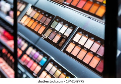 Set Of Cosmetics On Shelves In Beauty Store