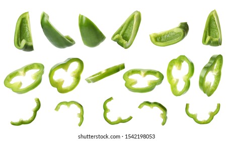 Set of cut fresh green bell peppers on white background