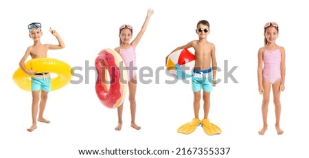 Set of cute little children in beachwear, with paddles, ball and inflatable rings isolated on white