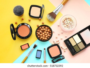 Set of decorative cosmetics on color background - Shutterstock ID 518732392