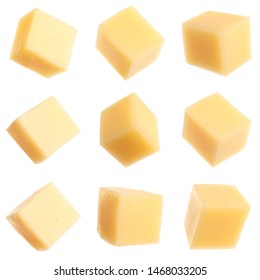 Set of delicious cheese cubes on white background