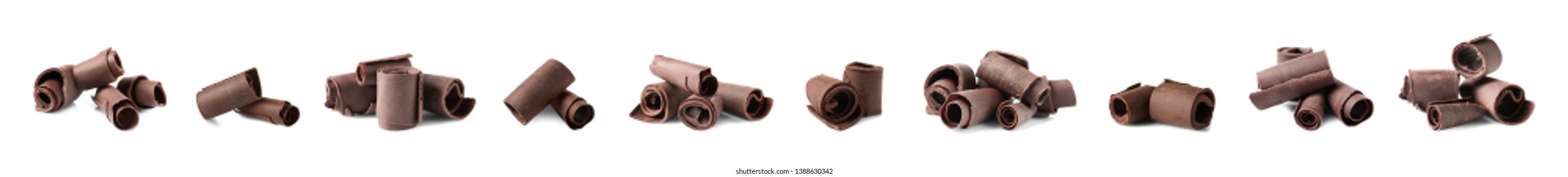 Set of delicious chocolate curls on white background
