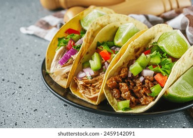 set of delicious juicy tacos on a light stone background. - Powered by Shutterstock