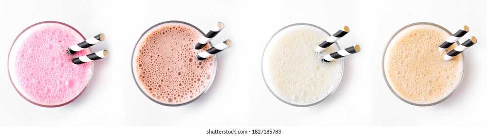 Set Of Delicious Milk Shakes Or Smoothies Isolated On White Background. Various Protein Shakes,  Strawberry, Chocolate, Vanilla, Caramel Energy Drinks, Top View.