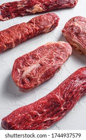 Set Of Denver, Top Blade, Tri Tip Steak, Machete, Flank, Bavette London Broil Marble Beef On White Background Side View Close Up