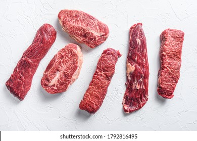 Set Of Denver, Top Blade, Tri Tip Steak, Machete, Flank, Bavette London Broil Marble Beef On White Background Top View