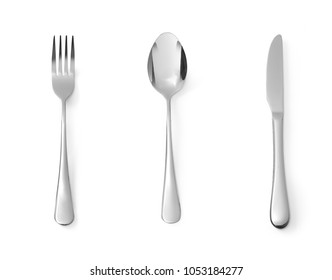 Set of dessert cutlery spoon fork and knife stainless steel isolated on white background