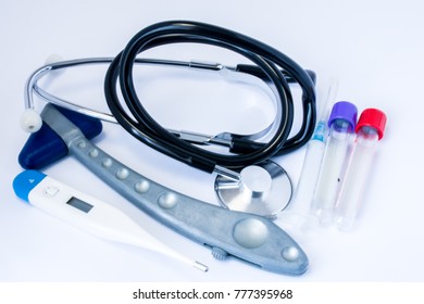 Set Or Diagnostic Of Family Doctor, Doctor Of Internal Medicine Or General Practitioner,  Includes Neurological Hammer, Stethoscope, Thermometer And Laboratory Test Tubes For Blood Sampling 