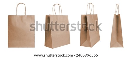 Set of different angles blank brown craft paper bags isolated on white, background. Eco friendly shopping bag made from recycled paper, ecology, recycling concept. Mockup, template, copy space