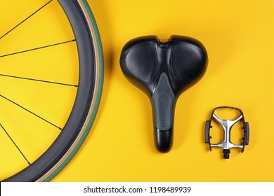Set of different bicycle parts on color background, flat lay