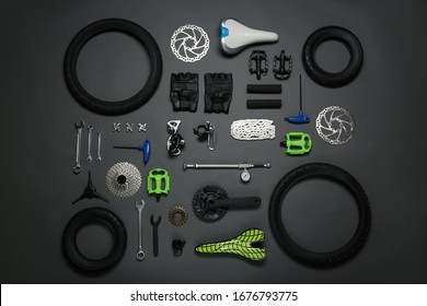 Set of different bicycle tools and parts on grey background, flat lay - Powered by Shutterstock