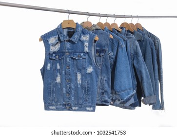 Set Of Different Blue Jeans Jacket On A Hanger
